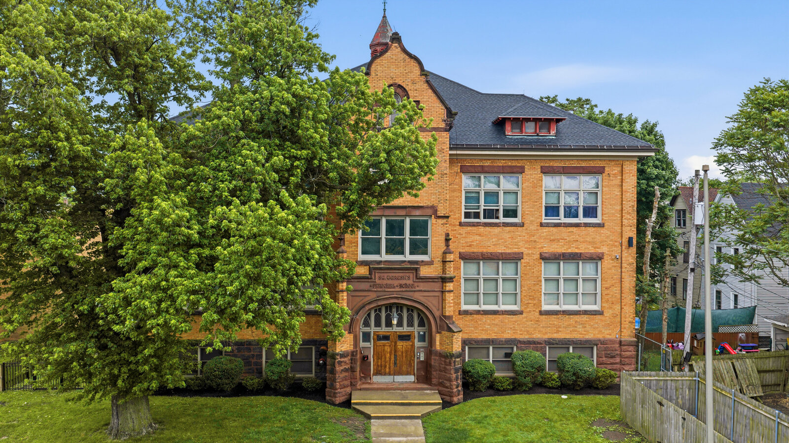 Aerial view of Mineral Springs Lofts in its Buffalo neighborhood
