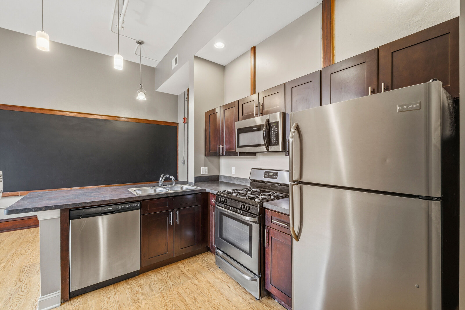 Loft kitchen with stainless appliances